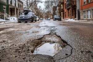 Potholes might cost American drivers as much as $26 billion per year, says AAA