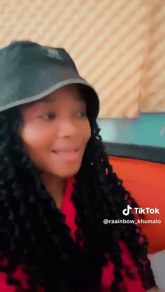 Fashion Statement: Bold Bucket Hat and Bright Pink Outfit