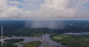 rain arriving in the amazon rainforest