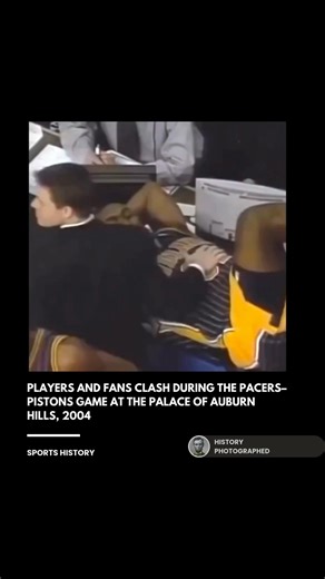 The 2004 "Malice at the Palace" saw a massive brawl erupt after a fan threw a drink at Ron Artest, who responded by charging into the stands to confront the spectator. The resulting chaos led to the harshest penalties in NBA history, including Artest’s record-breaking 86-game suspension and lifetime bans for several fans. Credits: NBA, Warner Bros Discovery, Netflix, AP Archive | History In Pictures