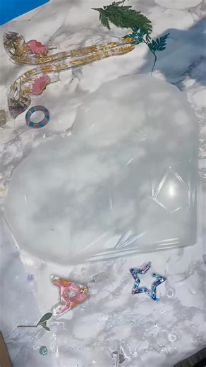 Throwing it back to when I painted this heart mould filling it in with chameleon powders ✨ The shimmer on this one still gets me every time Chameleon Powders @letsresin use code RESINABOUT for discount ✨ #resinabout #resinart #resinartistuk #resinreel #resinpour #resinlove #resinobsessed #resinartuk #resinmould #resinpainting #chameleonresin #resinartdaily | Resin About