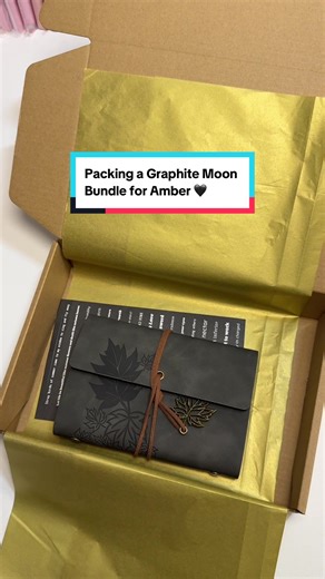 Packing a Graphite Moon Bundle for Amber 🖤🌑 Graphite Moon is calm, minimal, and a little mysterious — it felt like the perfect choice for this order. Moments like this remind me why I put so much care and intention into every single bundle I create. Thank you for the trust, the support, and for choosing my small shop 🤍 More packing videos coming soon. #smallbusinesslove #behindthescenes #bookishbundle #packingorders #stationeryshop