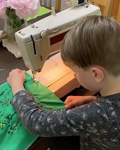 Montessori Elementary Practical Life: Quilting When your Mama brings home all the embroidery squares her Montessori 3-6 year old students have worked on all year. And you rummage through my bag and find the stack belonging to your bestie. And you tell me you’ll do that one. And then you carefully set the needle and get to it slowly because you know the work your friend has put into it over the years. Just like you did for your own quilt. This is multi-age, child to child mentorship. This is Mont