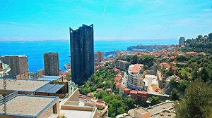 Panoramic view of Luxury Modern Bay Hotels and Resorts in the center of Monaco. Aerial view of the entire Monaco Country with skyscrapers and a wealthy lifestyle.