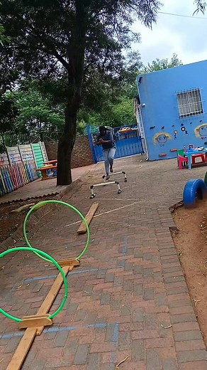 5.8K views · 22 reactions | We kicked off the week with a full obstacle course .. from big hurdles, balancing, crawling through hula hoops, to jumping over and inside them. Each movement helps build coordination, balance, strength, and confidence while keeping learning fun and active. Join us this week as we jump, crawl, and balance our way to stronger bodies and brighter smiles #GrossMotorSkills #FunLearning #GrossMotorSkills #childdevelopment #kids #preschool | Previledge Dube | Facebook