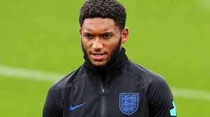 Joe Gomez: Liverpool defender out of England squad after suffering potentially serious knee injury
