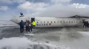 2.3K views · 21 reactions | Delta plane flips upside down in Toronto crash landing, at least 17 injured. Dramatic images and videos on local broadcasts and shared on social media showed people stumbling away from the upside down CRJ-900 plane, shielding their faces from strong gusts of wind and blowing snow. No explanation of the cause of the accident, or how the plane ended up on its back with its wings clipped, has been provided. Credit: AFP | Daily Express Malaysia | Facebook