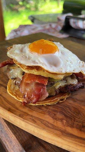 🔥 Smash Burgers with Maple Pancake Buns and Fried Eggs cooked on the @Weber Grills Canada Slate 30” Rust-Resistant Griddle #ad🔥 Combining savory and sweet for the ultimate burger experience! Juicy smash burgers topped with cheddar, caramelized onions, and fried eggs, nestled between fluffy maple pancake buns. Drizzle a little extra maple syrup on top for the perfect finishing touch. #webergrillsca
