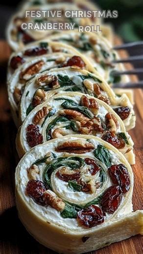 Tortillas spread thick. Sprinkle cranberries, pecans, green onions. Roll tight and chill for 1 hour—creamy, festive, sweet-savory pinwheels with a holiday crunch. Ingredients ➤ 8 oz cream cheese, softened ➤ 1/2 cup dried cranberries, chopped ➤ 1/4 cup chopped pecans ➤ 1/4 cup finely sliced green onions FULLL Recipe in First Cօʍʍеոτ 👇👇 | Nessy Recipes