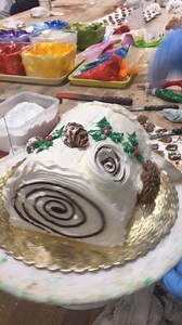 Let it snow! Hand made & Hand Decorated Yule cakes are here! A classic Bûche de Noël cake, we start with our chocolate cake and fill it with delicious raspberry buttercream and then hand decorate this with a festive design and garnish it with a bit of powdered sugar (aka Snow!!) :) | O&H Danish Bakery