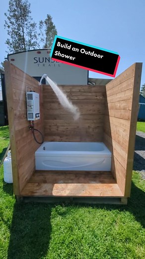 I built an outdoor shower out of our old bathtub, I'm using a Camplux Hot Water on demand system and it works great! We haven't run out of hot water yet! Kids have been having fun taking warm baths and they don't have to worry about splashing around. #modernhomestead #outdoorshower #diy #howto #camplux #letsbuild #outdoors #shower