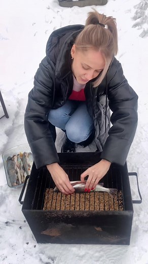 Cooking Trout on a Charcoal Grill in Winter