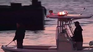 Coast Guard suspends search for man who fell off capsized boat in Fall River