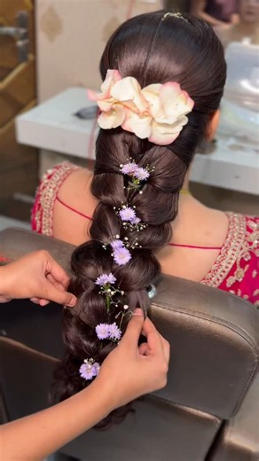 Nancy Pundir | Adding flowers on a braid made easy 🌸✨ We know it’s super simple to decorate a bun, but when it comes to braids — it gets tricky! 😅 Here’s... | Instagram