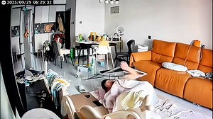 Ceiling light falls on sleeping man in Beijing, China