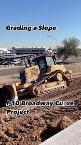 Crews with the I-10 Broadway Curve Improvement Project have been working to grade the slope next to westbound I-10 between the Salt River bridge and 24th Street. They are also paving the final sections on either side of the new I-10 eastbound lanes. | Arizona Department of Transportation