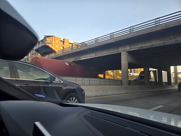 ‘No structural damage’ after semi truck stuck under 11th street bridge