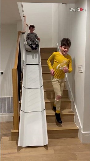 *DIY slide idea* Kids enjoying their makeshift stair slide with delight || WooGlobe