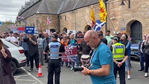 Protesters gather outside hotel in Perth