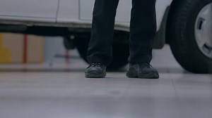 clip-6379913-low-angle-shot-person-walking-towards-camera