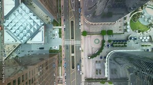 Aerial view Los Angeles. Drone shot downtown LA. Top down view street road with cars. office buildings, skyscrapers, apartments. Urban life, city in America.