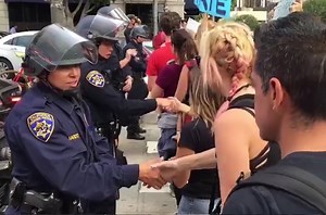 These cops and protesters brilliantly shake off a tense situation