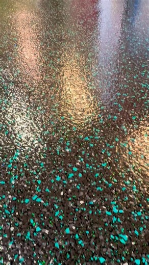 Floor number 19 for 2026 is 🥁…… “CARBON BLACK” Carbon black flake with 15% mint slice highlight with added peppermint green glitter. This is now the perfect showroom to showcase this gorgeous classic and all the man toys it can hold. 💚 What we did: ➡️ A full machine grind ➡️ Fixed any minor chips and cracks ➡️ Laid our 100% solid epoxy system with full broadcast of our Ultra Flake and topped off with our beautiful UV clear coat to protect it for years to come. What are the benefits of epoxy fl