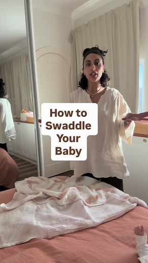 How I swaddle my baby 🤍✨ A simple, grounding little rhythm that helps both of us slow down… Swaddling recreates that snug, womb-like feeling — helping baby feel safe, secure, and ready to rest 🫶 Why we love it: ✨ Encourages longer, more settled sleep ✨ Helps reduce the startle (Moro) reflex ✨ Creates a sense of comfort and security ✨ Can support easier transitions into naps bedtime How I do it: • Lay the wrap in a diamond shape and fold the top corner down • Place baby with shoulders just belo