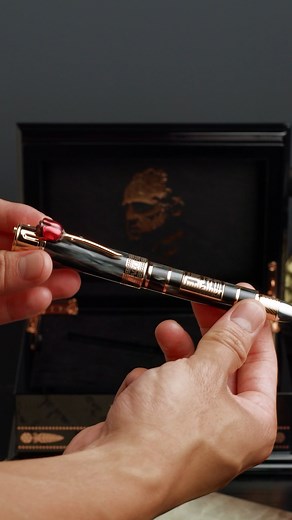 124K views · 3.3K reactions | An offer you can't refuse. The Godfather Pen Collection merges timeless elegance with iconic symbolism, honoring Mario Puzo’s and Francis Ford Coppola’s unforgettable legacy. Experience the art of storytelling in every stroke. Made In Italy Black Rollerball Pen Limited Series Of 499 Pieces Cap & Barrel: Charcoal Celluloid Trim: Rose Gold Plated Sterling Silver #JacobAndCo #Inspiredbytheimpossible | Jacob & Co. | Facebook
