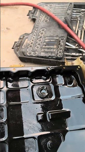 #1755 Cleaning the transmission pan of a 2011 Nissan Pathfinder. Does it use matic S or matic J oil?