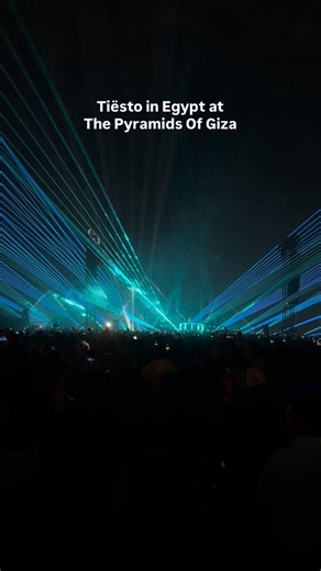 Tiësto is live at the Pyramids of Giza. So many classics back to back, the kind that hit instantly and pull the whole crowd in. The pyramids stay glowing behind the stage as the Giza Plateau moves together, every drop landing heavier in a setting like this. One of those rare nights where nostalgia, scale, and atmosphere all meet at once, happening right now under the pyramids. Follow @cairospots, visit our website cairospots.com and download our Cairo Spots iOS app for live updates and on ground