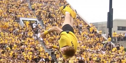 Cheerleader who lost pants in mid-air takes viral fame in stride