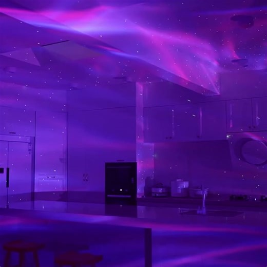 Transform your space with the magic of the aurora! This 360° projector fills your room with vibrant light modes, music-reactive effects, and soothing ambiance. Perfect for parties, relaxation, or drifting off to sleep. Remote controlled, dimmable, and designed for every mood. | Clover Duo