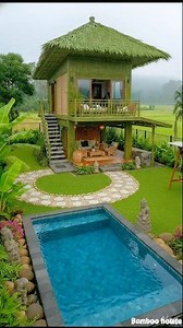 5.4K views · 55 reactions | A stunning two-story bamboo house surrounded by lush rice fields, a serene garden, and a private swimming pool. This tropical design blends natural materials with peaceful living, creating the perfect inspiration for a villa, homestay, or a dream home in nature. #BambooHouse #TropicalDesign #NatureLiving #EcoHome #VillaInspiration #trading | Bamboo House | Facebook