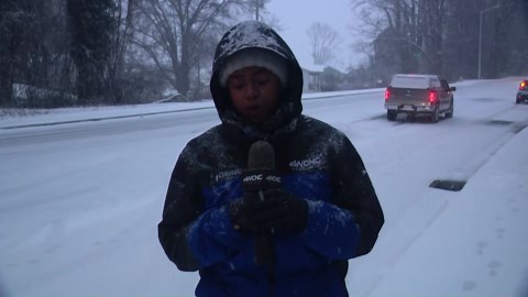 Drivers get stuck on snow-covered roads in Hickory