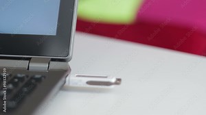 Connecting a USB drive to a laptop Stock Video