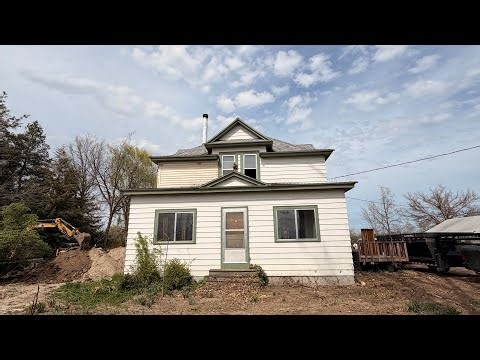 Stepping inside our 1915 home… but not the way it once was.