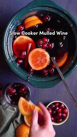 need a last minute cocktail recipe for a crowd? this easy mulled wine is the quintessential holiday party drink. Skip the stove top and make this warm cocktail in a slow cooker. #mulledwine #holidays #cocktails