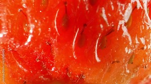 Strawberries, Highlights the sepal crown, a green, leaf-like structure that sits atop the fruit. The sepal crown adds a touch of freshness and serves as protection for the developing strawberry.