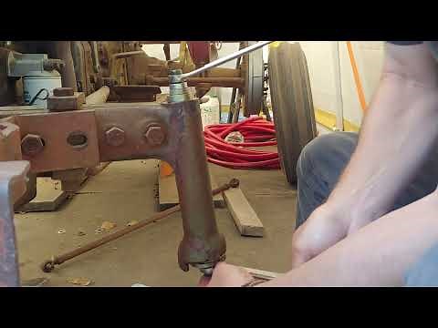 installing spindle bushings on a 135 Massey Ferguson.