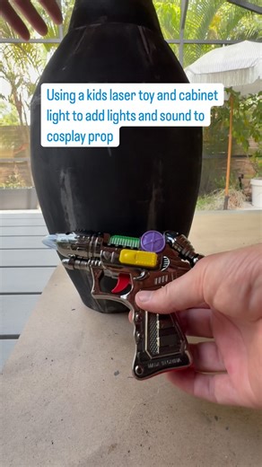 laughingcosplay on Instagram: "Want to add lights/sound to cosplay props👇 There are so many non-traditional cosplay materials that can be found around your house or on Amazon that you can use to incorporate into your cosplay prop to add lights and sound. I’m making a MegaMan cosplay for my son and wanted to find a solution to make his arm blaster light up and make a laser sound. Found a cheap kids laser toy and a 6 inch battery powered under-cabinet light that worked really well! Don’t be afrai