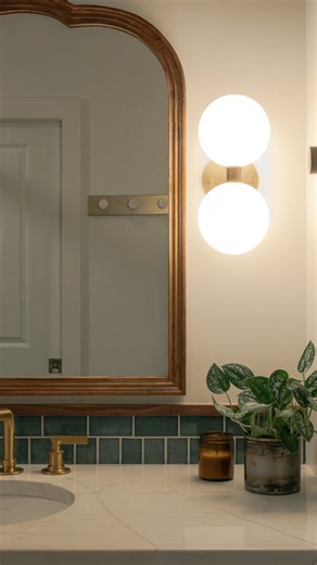 commoner design co. on Instagram: "small bathroom with a major transformation. another space from our studio condo project where our client loves blue 🌊 most builder-grade condos come with the basics — a vanity with little personality, lighting that doesn’t inspire, a standard shower/tub (not pictured) that feels anything but special. we leaned into our client’s love for blue + used @zia_tile fuji 2x4 tile across the floor + into the shower. on the walls, we paired nagano 2x4 by @zia_tile with 