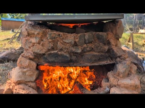 Making a primitive kiln to fire clay bricks and pottery in. - how to make cobb the easy way
