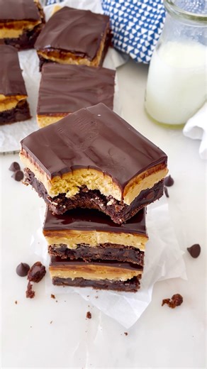 12K views · 66 reactions | This is your sign to make buckeye brownies  Rich, fudgy brownies loaded with chocolate chips, layered with chewy peanut butter fudge, and topped with silky ganache. Basically, the perfect mash up of brownies + buckeye candy, and it’s as good as it sounds  Comment BUCKEYE if you want the recipe! | Beyond Frosting | Facebook