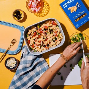 Sweet, tangy, and vibrant — our Antipasto Pasta Salad bursts with flavor from bell peppers, tomatoes, provolone, deli meats, and a mix of penne, rotini, and small shell pasta. Mix it up! Get recipe: https://ronzoni.com/recipe/trio-antipasto-salad/ | Ronzoni Pasta