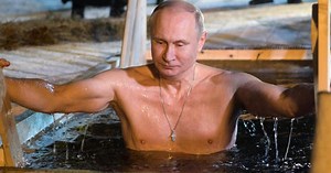 Russian President Putin takes icy dip on Epiphany