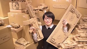 Japanese artist converting cardboard to art