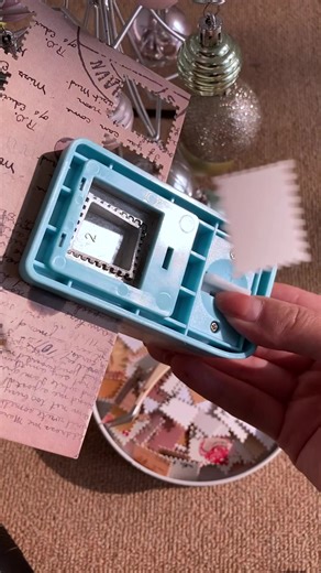 Turn any paper into a perfect postage-stamp edge in one smooth press #Journaling #scrapbooking #StampPunch #PaperPunch #CraftPunch