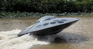functional UFO jet boat zooms through water as a motorized flying saucer for lakes or rivers