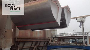 Govaplast, the unloading of a barge boat with heavy machinery on a plastic deck.